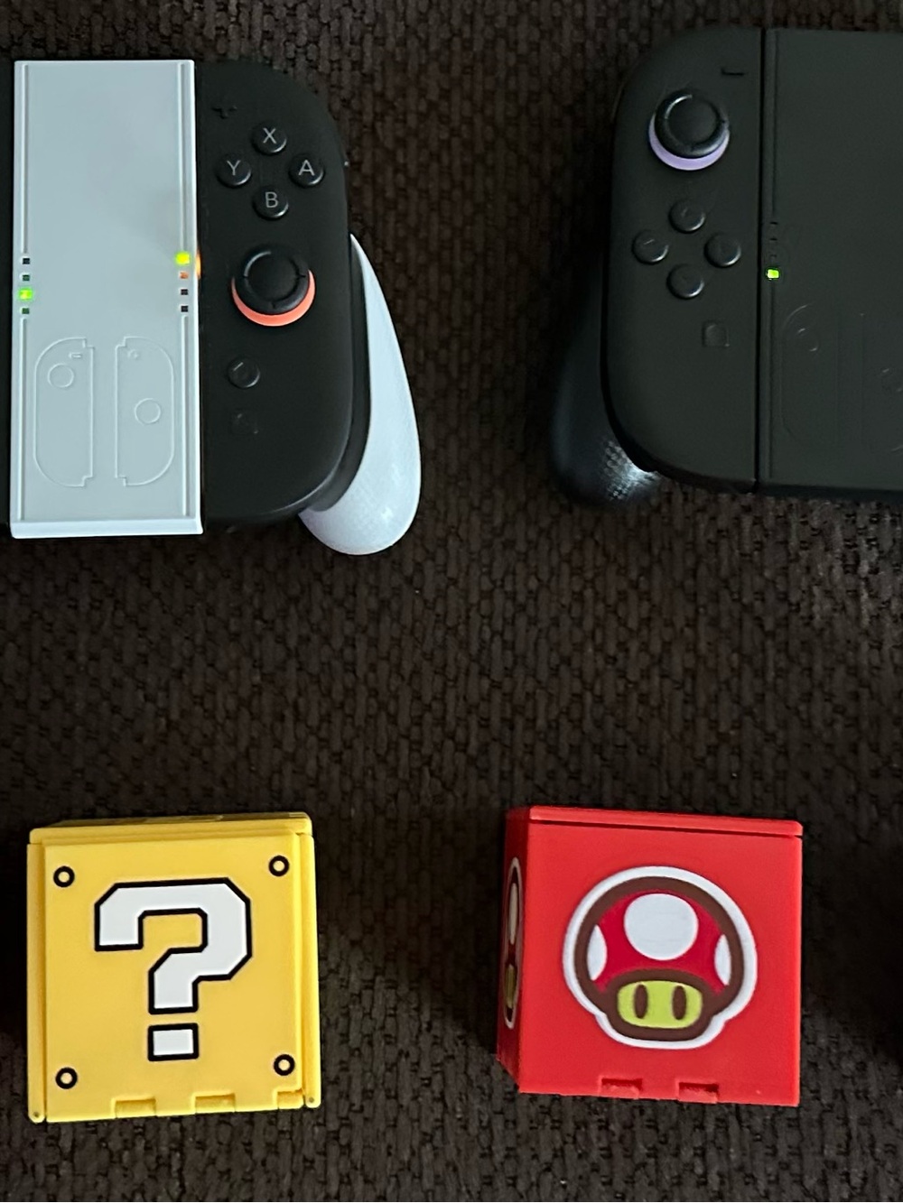 Nintendo Joy-Con Pair with White Grip and Red/Yellow Mario Blocks/Zelda black